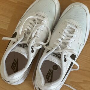 Nike Women’s white and black golf shoes
